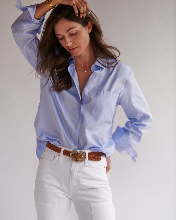 Female model wearing the light blue Fletcher Twill Shirt.