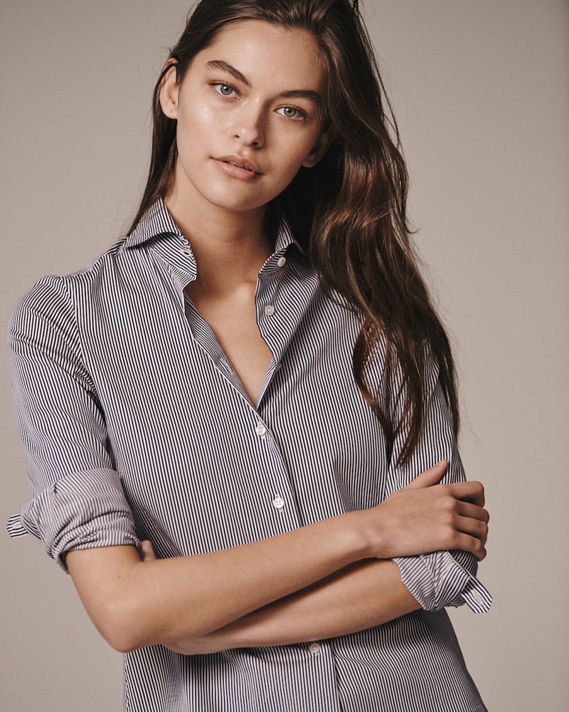 Close-up of a female model wearing the navy and white Pearson Striped Stretch Poplin Shirt.