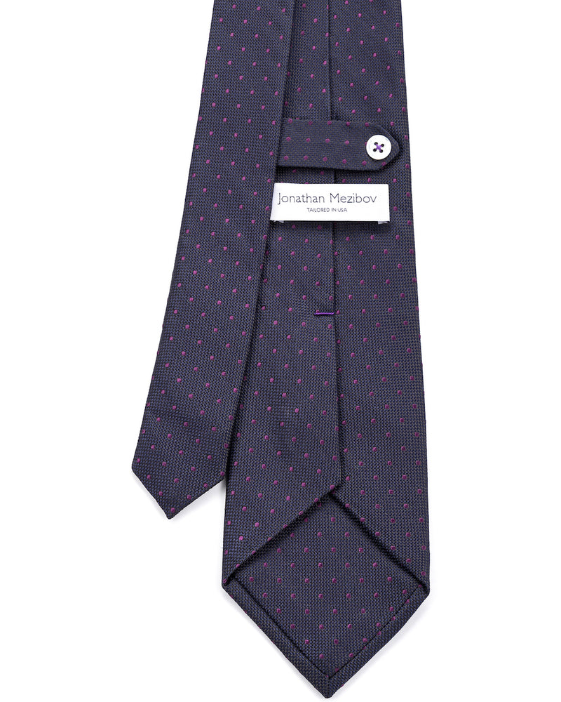 Close-up of the signature tab keeper loop on the Dotted Silk Jacquard Tie.