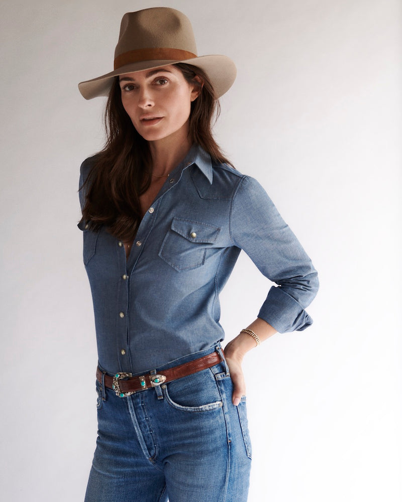 Female model in the Chambray Western Shirt and jeans.
