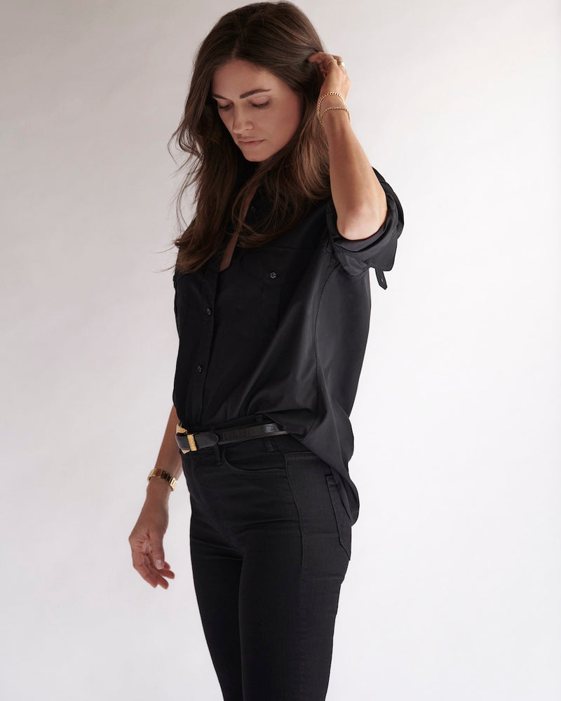 Side view of a female model wearing our Fletcher Twill Military Shirt.