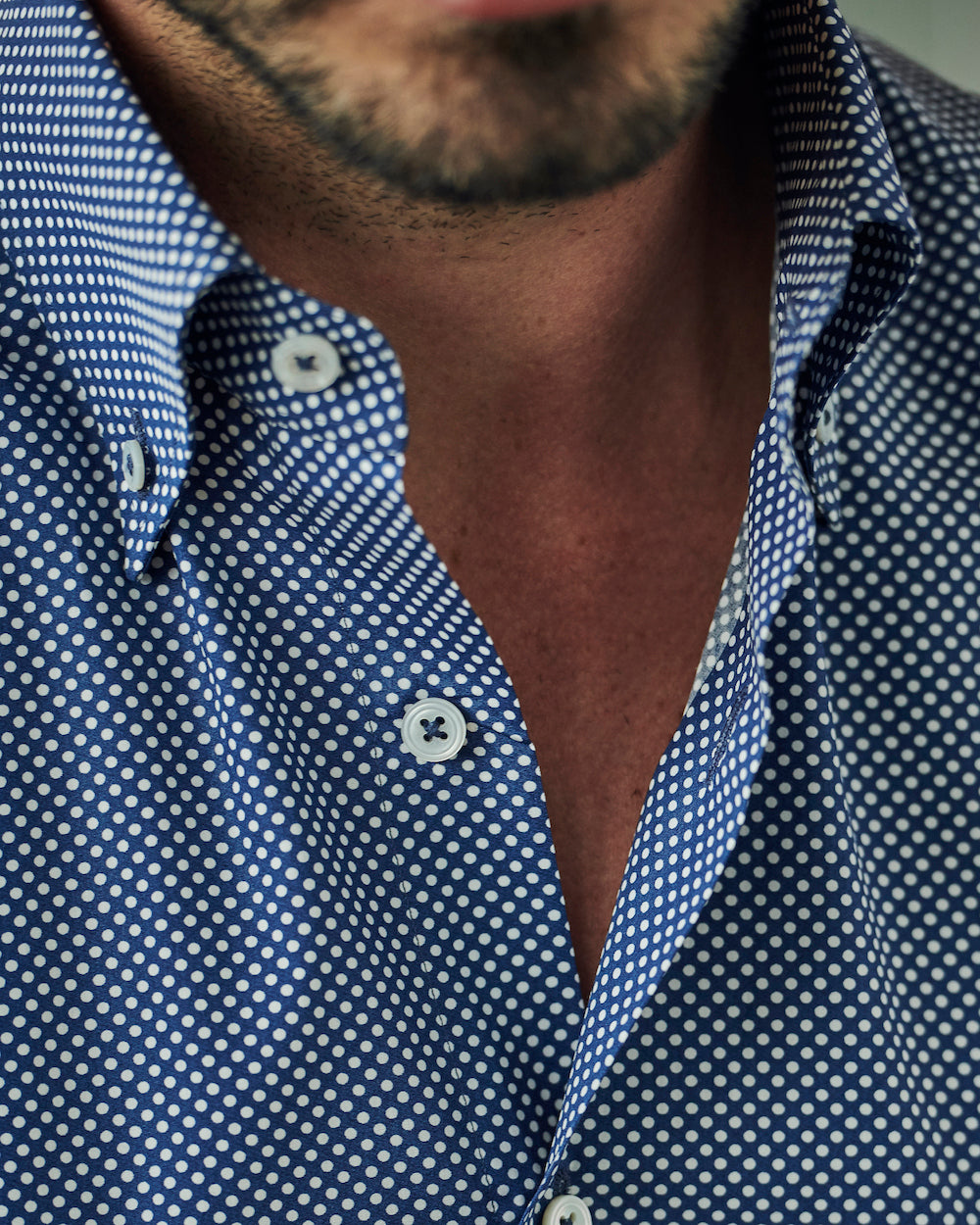 Close-up of the button-down collar on the Gordon Polka Dot Shirt.